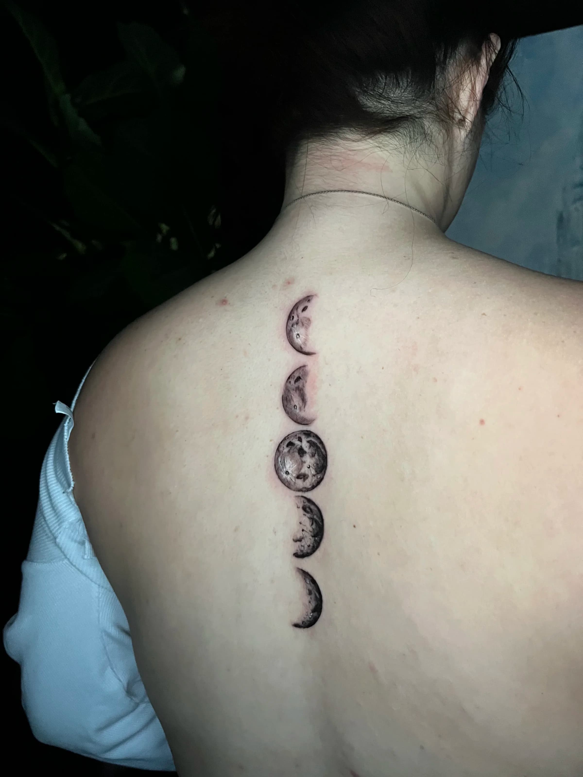 Moon phases line work tattoo