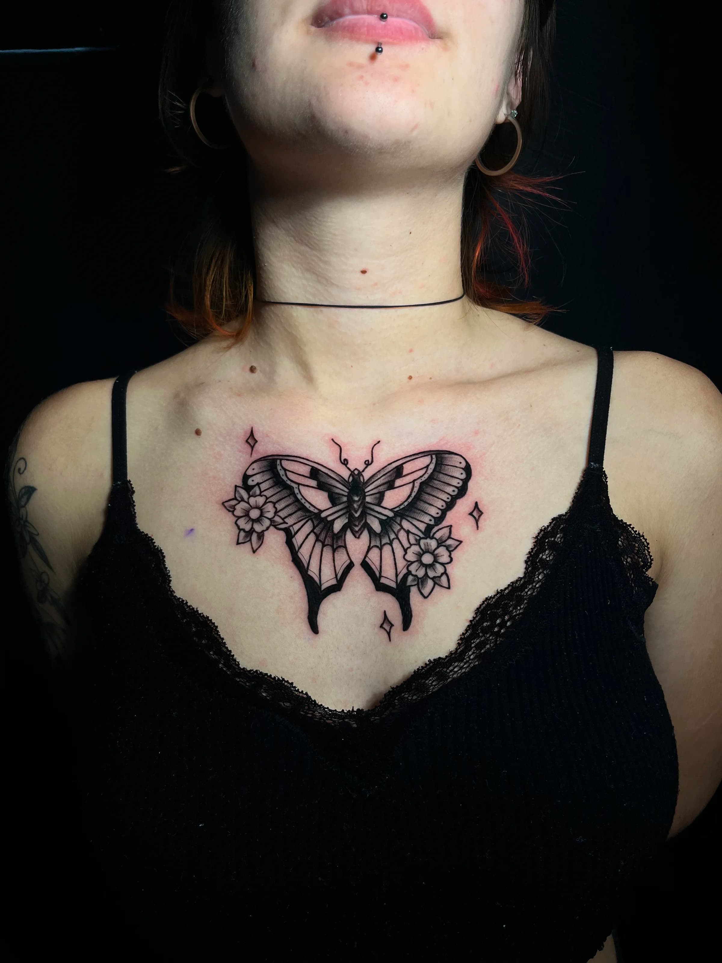 Butterfly fine line chest sternum tattoo
