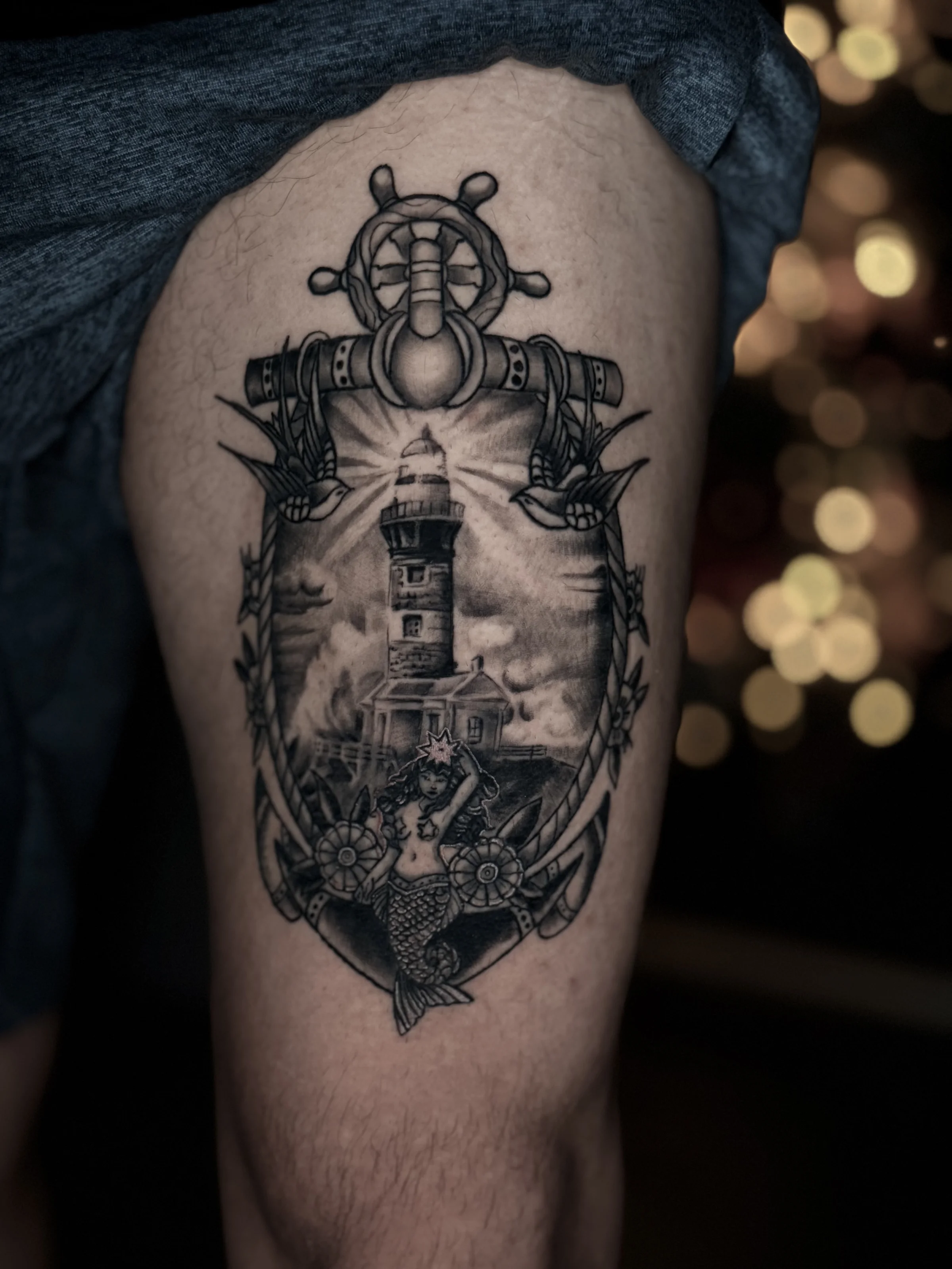 Nautical anchor and lighthouse blackwork