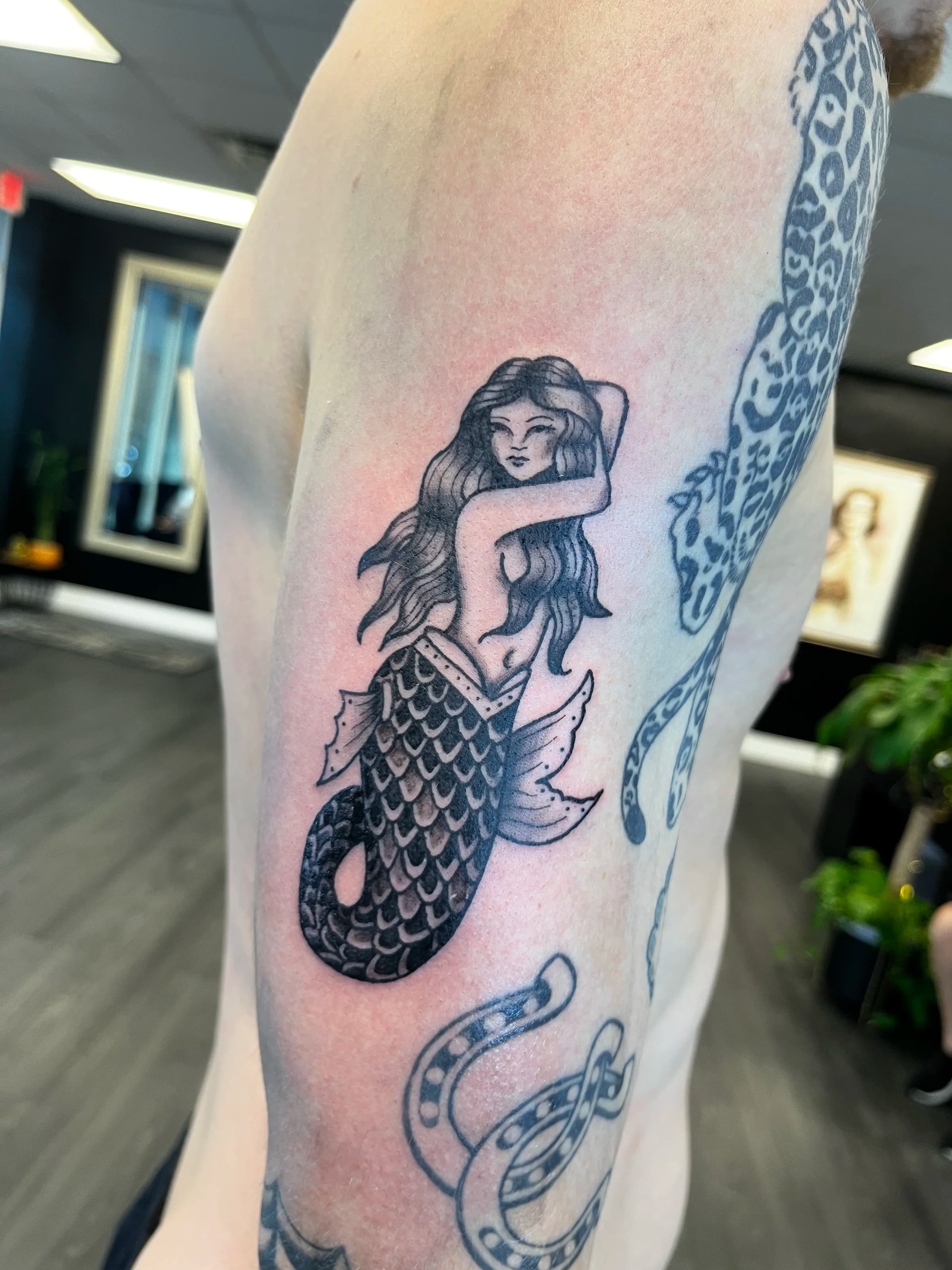 Traditional mermaid color tattoo